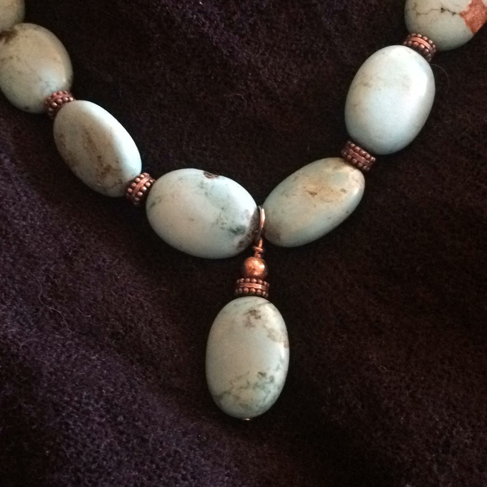 Turquoise colored stone bead necklace